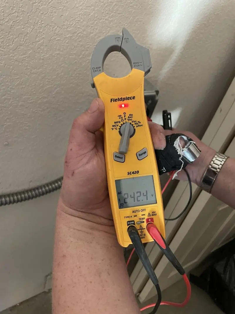 Voltage testing with clamp meter during Outlet Installation in Trenton